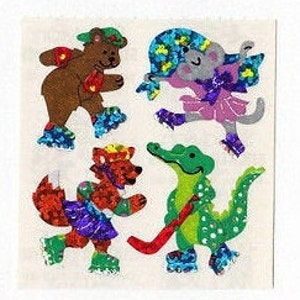 May include: Four colorful animal stickers on a white background. The stickers feature a bear, a mouse, a fox, and an alligator wearing roller skates. The animals are all wearing colorful clothing and hats.