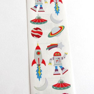 May include: A sheet of colorful space-themed stickers featuring robots, rockets, planets, stars, and UFOs.