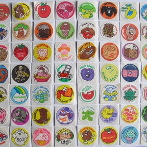 Huge Lot of Vintage 80&#39;s Trend Matte Scratch and Sniff Stickers - Popcorn Taco Grape Skunk Cherry Spice Peach Bone Cave Plum Cookie Honey