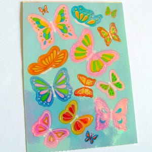 Hermosas mariposas vintage Sandylion perladas Maxi hoja de pegatinas - Alas de mariposa arcoíris iridiscentes de ópalo perlado de los años 80