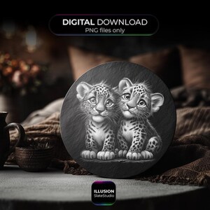May include: A black and white illustration of two leopard cubs on a round slate coaster. The coaster has the text "DIGITAL DOWNLOAD PNG files only" and the Illusion SlateStudio logo.