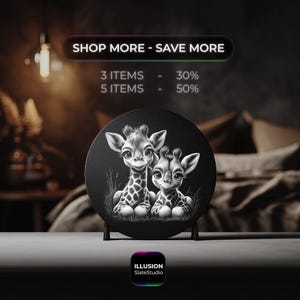 May include: A black and white circular decorative piece featuring two adorable giraffe illustrations. The giraffes are sitting in grass. The text "SHOP MORE - SAVE MORE" is at the top, with discount details. The Illusion SlateStudio logo is at the bottom.