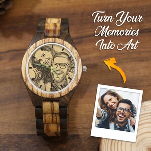 May include: A wooden wristwatch with a custom engraved portrait of a couple on the watch face. The watch features a dark and light wood grain band and case. Next to the watch is a square photograph of the same couple and the text Turn Your Memories Into Art.