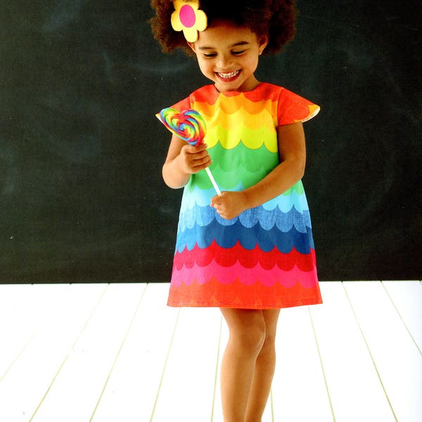 girls dress in rainbow scallop print