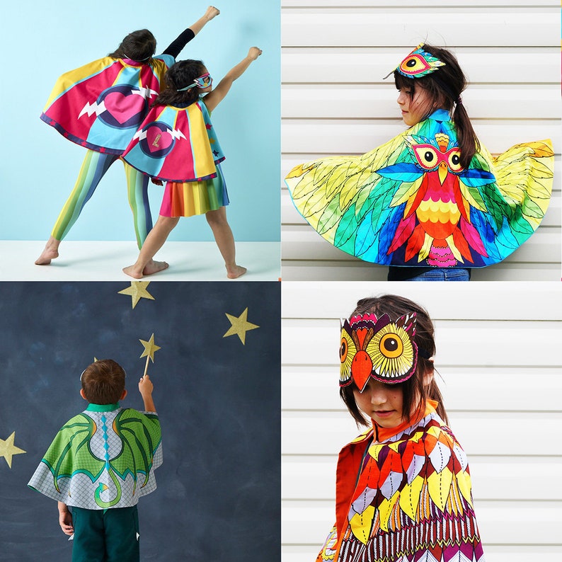 May include: Four children wearing colorful capes and masks. The capes feature different animal designs, including an owl, a dragon, and a heart. The masks are also animal-themed. The children are all smiling and looking happy.