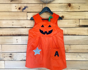 Girls Halloween pumpkin dress , personalised baby dress, toddler girls pinafore  with pumpkin face , baby romper