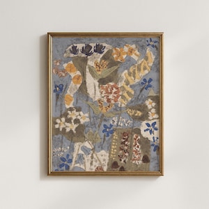 May include: A framed floral art print with a gold-coloured frame. The artwork features a variety of flowers in shades of blue, yellow, orange, and white against a muted blue background. The painting has a vintage aesthetic.