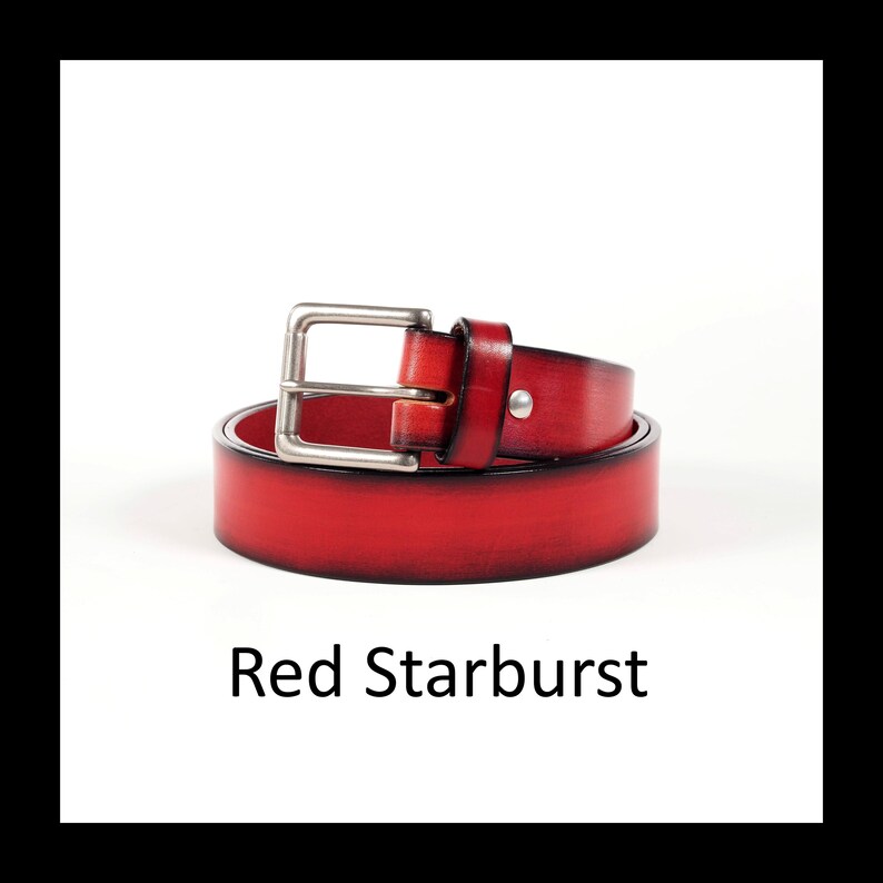 May include: A rolled-up red leather belt with a silver-colored buckle. The belt is a vibrant red color and features a single silver stud. The text "Red Starburst" is displayed below the belt.