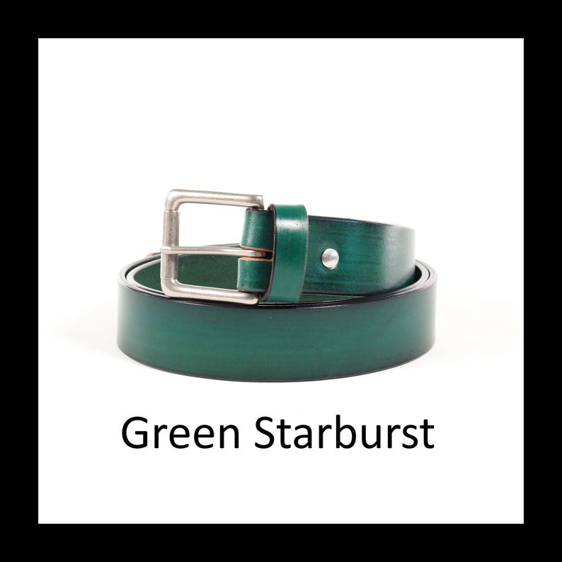May include: A rolled-up, emerald green leather belt with a silver-colored buckle. The belt has a single silver-colored stud. The text "Green Starburst" is below the belt.