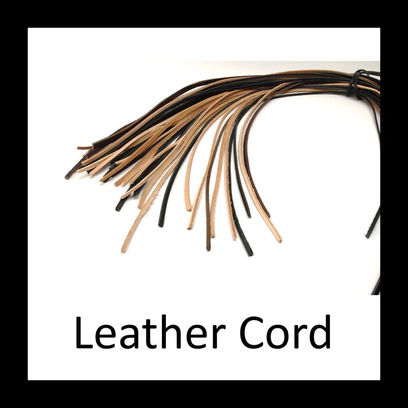 May include: A collection of black and tan leather cords. The cords are thin and appear to be made of genuine leather. The words "Leather Cord" are displayed in a black font at the bottom of the image.