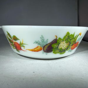 May include: A rustic wooden sign with the text "Welcome to our home" in white lettering. The sign features a distressed finish and a simple, inviting design, perfect for a front porch or entryway.