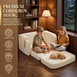 May include: A modular, off-white corduroy play couch with two children and a puppy. The couch is in a room with a bookshelf and a window. The text on the image reads "PREMIUM CORDUROY NOOK. GENTLE TOUCH FOR PLAY, COZY MOMENTS & PETS."