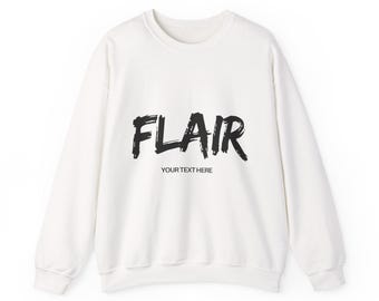 May include: A white long-sleeve crewneck sweatshirt featuring the word FLAIR printed in a bold, black, brushstroke-style font across the chest, with the smaller text YOUR TEXT HERE printed in a simple black sans-serif font directly below it.