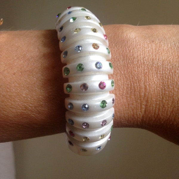 Lucite cuff Ivory color with Multicolor rhinestones Sold AS IS