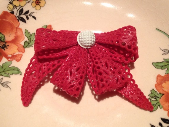 Brooch Celluloid molded 1930s red bow - image 1