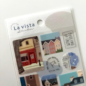 May include: A sheet of decorative stickers featuring various architectural illustrations. The stickers include images of buildings, houses, and cityscapes, with the text "La vista Sticker" and "Feeling of Calm". The stickers are in various shapes and sizes.