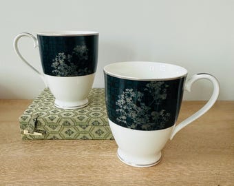 Vintage Set of 2 Noritake Verdena Bone China Mugs | Dark Blue & Silver Floral Design | Elegant Asian-Inspired Footed Coffee Cups