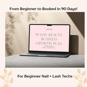 May include: A laptop screen shows a pink graphic with the text "90 DAY BEAUTY BUSINESS GROWTH PLAN" for beginner nail and lash technicians. The laptop is on a grey surface, with the text "From Beginner to Booked in 90 Days!" above and "For Beginner Nail + Lash Techs" below.