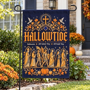 May include: A dark blue garden flag featuring the orange text HALLOWTIDE, followed by Halloween, All Saints' Day, and All Souls' Day. The design includes a central cross, two birds, orange autumn leaves, pumpkins, and a procession of figures.