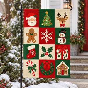 May include: A rectangular garden flag featuring a grid of twelve Christmas-themed illustrations including Santa Claus, a tree, a reindeer, a gingerbread man, a snowflake, a snowman, a stocking, holly, a gift, a candy cane, a wreath, and a house.