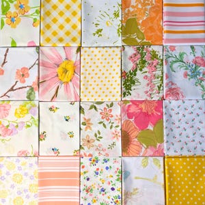 May include: A collection of twenty fabric swatches arranged in a grid, featuring various patterns including yellow gingham, polka dots, horizontal stripes, and diverse floral prints in shades of pink, orange, yellow, green, and white.