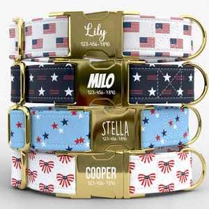 May include: Four dog collars with gold-colored buckles. Each collar features a different patriotic design: American flags, navy blue stars, light blue stars, and red bows. Each buckle is engraved with a name and phone number.