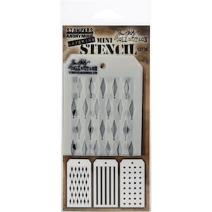 May include: A set of three stencils for crafting. The stencils are packaged in a clear plastic bag with a white background and black text. The text reads "Stampers Anonymous Layering Mini Collection Stencil Set 36". The stencils are made of clear plastic and feature different geometric patterns.