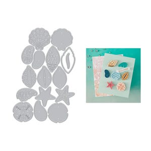 May include: A collection of die-cut shapes in the form of seashells and starfish, alongside a card decorated with similar designs. The card features various seashell embellishments in shades of blue, gold, and pink, with the text "YOU'RE A TREASURE".