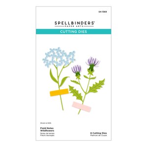 May include: A package of Spellbinders paper arts cutting dies. The package features die-cut paper wildflowers in light blue, purple, and green. The text on the package reads "Field Notes Wildflowers" and "Cutting Dies".