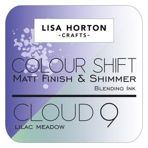 May include: A square label with rounded corners features the text "LISA HORTON - CRAFTS-" at the top. Below, "COLOUR SHIFT" and "CLOUD 9" are displayed in large font. The label also reads "MATT FINISH & SHIMMER BLENDING INK" and "LILAC MEADOW". The background is a gradient of purple and white.