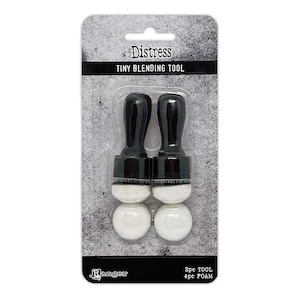 May include: Distress Tiny Blending Tool packaging with two black blending tools and four white foam pads. The packaging has the text "Distress Tiny Blending Tool" and "Ranger" on it.