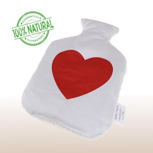 May include: A handmade wooden sign with the text "Welcome" in a handwritten style. The sign is painted white with a distressed finish, and a small, decorative heart is attached. The sign is designed for indoor or outdoor use.