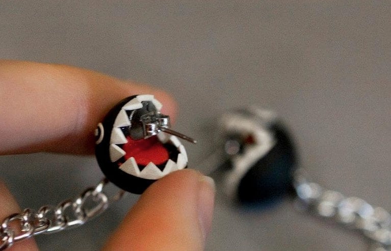 Chain chomp earrings discount