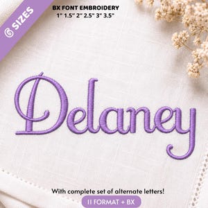 May include: A digital embroidery file featuring the name Delaney in a purple cursive font. Text includes BX FONT EMBROIDERY, 6 SIZES, 1 inch, 1.5 inches, 2 inches, 2.5 inches, 3 inches, 3.5 inches, and With complete set of alternate letters! 11 FORMAT + BX.