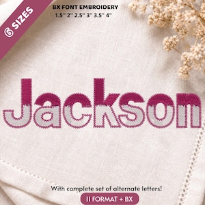 May include: An embroidery design featuring the name Jackson in a two-tone font with dark pink tops and light gray bottoms. The text BX FONT EMBROIDERY 1.5" 2" 2.5" 3" 3.5" 4" and With complete set of alternate letters! 11 FORMAT + BX are visible.