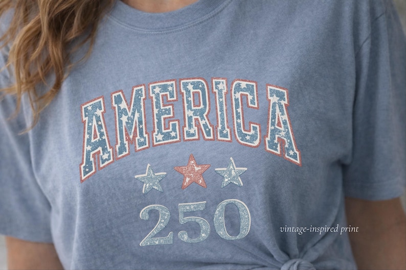 close up of vintage america 250 graphic tee, soft worn in print on comfort colors shirt