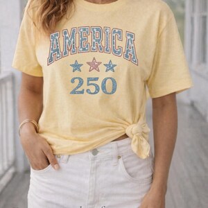 woman wearing patriotic america shirt with denim shorts, casual summer outfit 4th of july tee