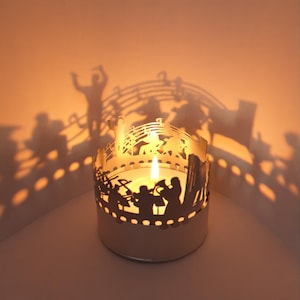 Orkestschaduwspel: silhouetkaarsbevestiging, muziekmotieven, creëert een prachtig kamerschaduwspel perfect cadeau voor muziekliefhebbers afbeelding 1