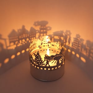 Bougie de jeu d'ombres du marché de Noël - Créez une atmosphère de fête magique avec un magnifique projecteur Silhouette