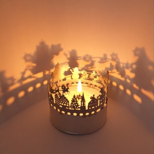 Weihnachtszeit Schattenspiel: Magisches Kerzenlicht mit zauberhaften Weihnachtsmotiven - Atmosphäre, Geschenkidee, Weihnachtsdekoration