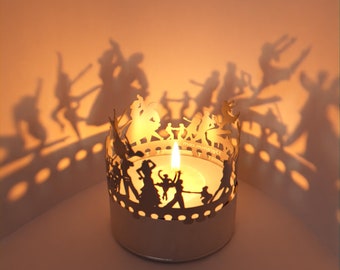 Transformez votre espace avec Dancing Shadow Play : bougie décorative pour une projection d'ombres époustouflante sur le thème de la danse - le cadeau parfait !
