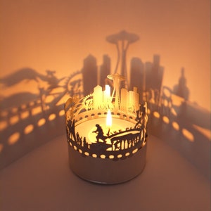 Jeu d'ombres sur la ligne d'horizon de Seattle : accessoire de bougie lanterne, projection de silhouette fascinante – Souvenir parfait pour les fans de Seattle !