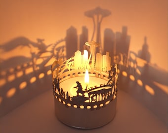 Jeu d'ombres sur la ligne d'horizon de Seattle : accessoire de bougie lanterne, projection de silhouette fascinante – Souvenir parfait pour les fans de Seattle !