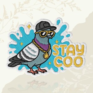 May include: Embroidered patch featuring a cool pigeon wearing a black cap, gold sunglasses, and a gold chain. The pigeon is set against a blue splash with the words "STAY COO" in yellow.