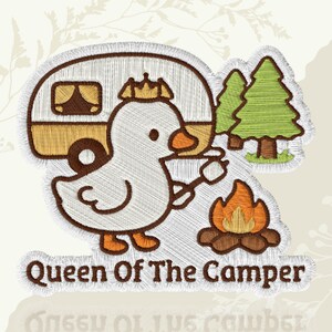 May include: Embroidered patch featuring a cartoon duck wearing a crown, holding a marshmallow over a campfire, with a camper and trees in the background. Text reads "Queen Of The Camper". The patch has a white border.