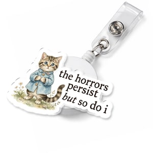 The Horrors Persist But So Do I Funny Meme Humor Badge Reel Retractable ID Clip Cat Dark Humor Existential Work Badge Holder For Uniform