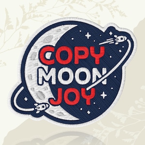 May include: Embroidered patch featuring a crescent moon and a dark blue background with stars. The patch has the words "COPY MOON JOY" in red and white. Two rockets are also featured in the design.
