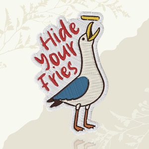 May include: Embroidered patch featuring a seagull with a yellow beak and a blue wing, reaching for a french fry. The text "Hide Your Fries" is in red, stitched above the seagull. The patch has a white border.