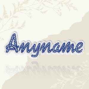 May include: Embroidered patch with the name "Anyname" in a blue, dotted font. The name is outlined in white and has a wavy border. The background is a light beige with floral and abstract design elements.