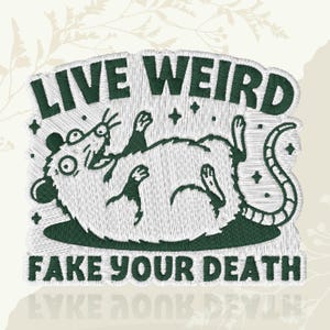 May include: Embroidered patch featuring a cartoon rat lying on its back. The rat is white with green details, surrounded by the text "LIVE WEIRD" and "FAKE YOUR DEATH" in green. The patch has a whimsical, slightly edgy design.